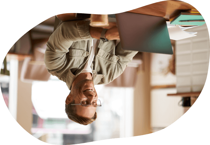 Person booking cattery online with laptop